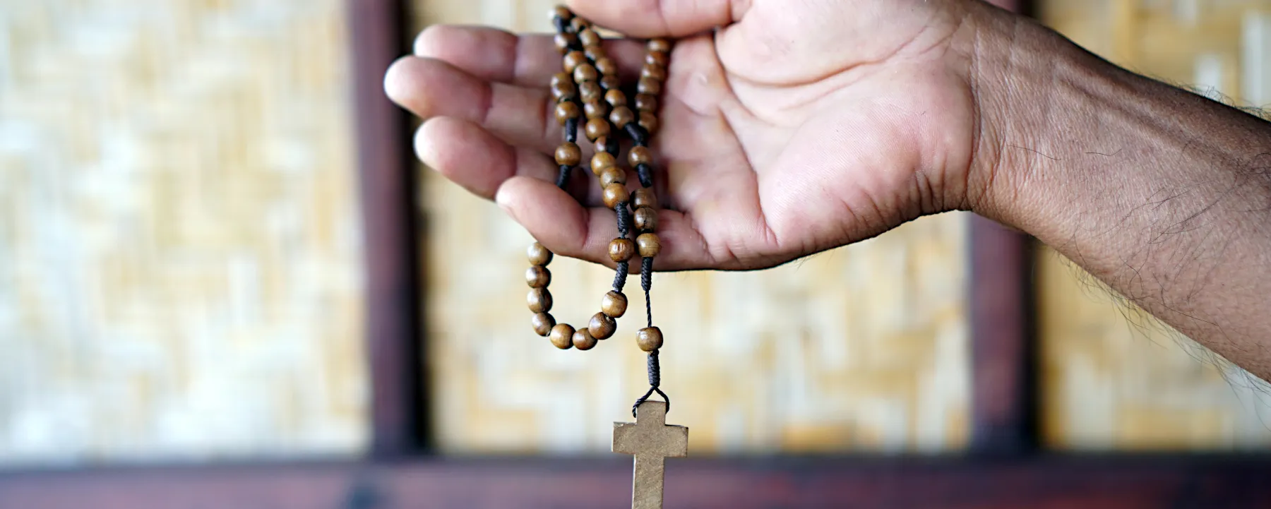 Rosary in hand